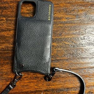 Black Bandolier Cross Body phone carrier for iPhone 11 ProMax.